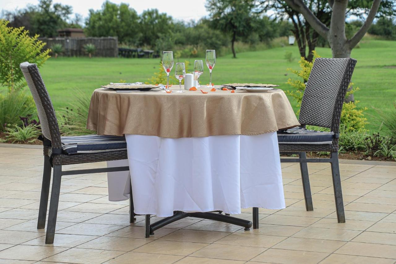 Royal Marang Hotel Phokeng エクステリア 写真 A table with a tablecloth